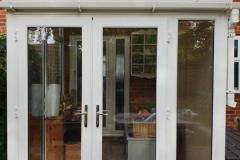 uPVC French door installation with clear glass & Side-panel