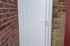 uPVC Back door with full length tongue-grooved panel