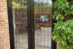 Black uPVC French door Installation in Tadley