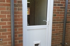 uPVC Back door installation with clear glass & Cat-flap